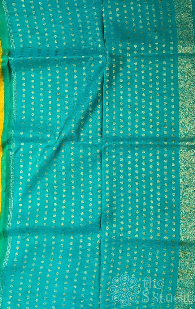 Mango yellow pen kalamkari kanchi silk saree with hand painted with pichwai motifs and aqua blue pallu