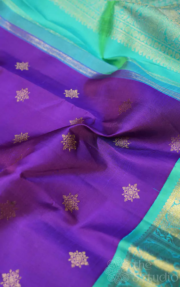 Violet Kanchipuram silk saree with sea green korvai border