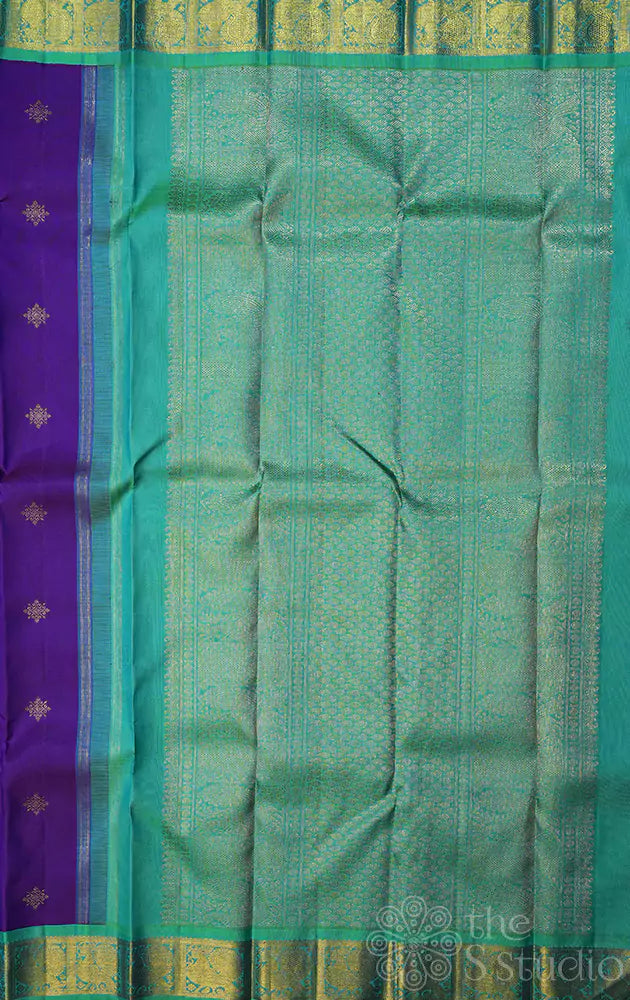 Violet Kanchipuram silk saree with sea green korvai border