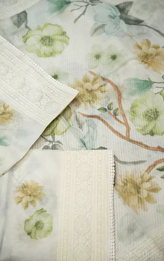 Off-white supernet saree with green floral prints