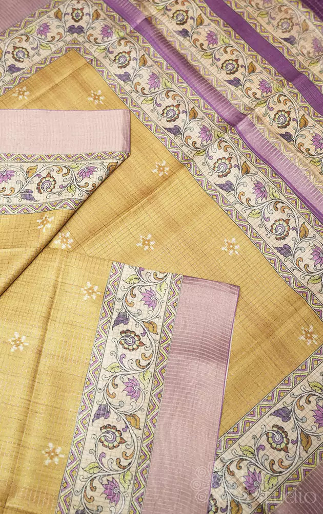 Light mustard semi tussar saree with floral prints