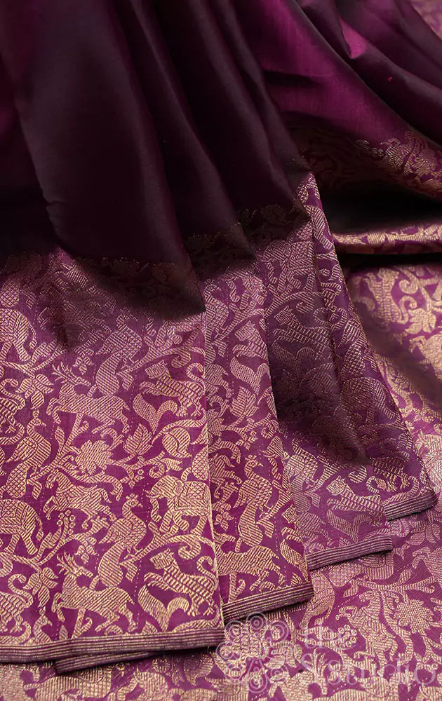 Purple kanjivaram silk saree with vanasingharam border