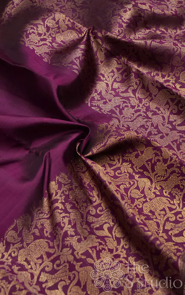 Purple kanjivaram silk saree with vanasingharam border