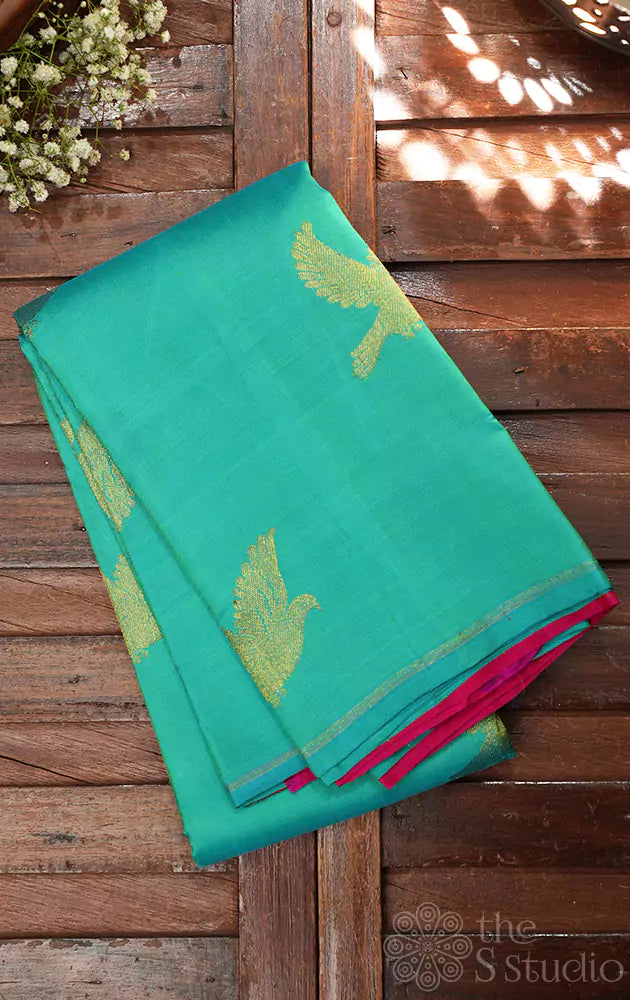 Bluish green colour kanchipuram silk saree with bird motifs