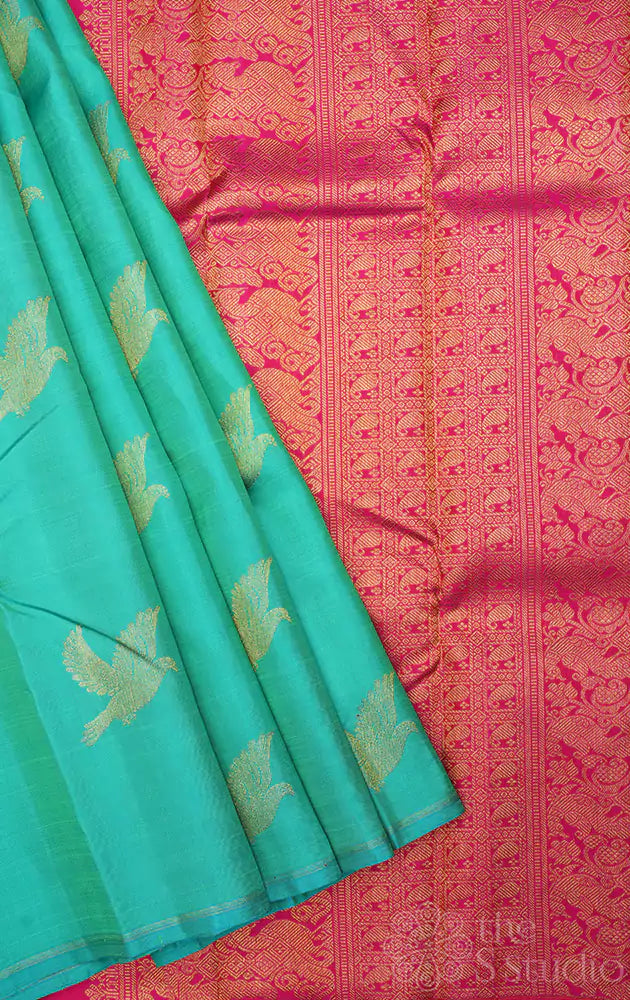 Bluish green colour kanchipuram silk saree with bird motifs
