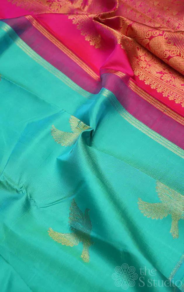 Bluish green colour kanchipuram silk saree with bird motifs