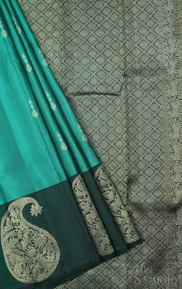 Rama green kanjivaram silk saree with paisely motif
