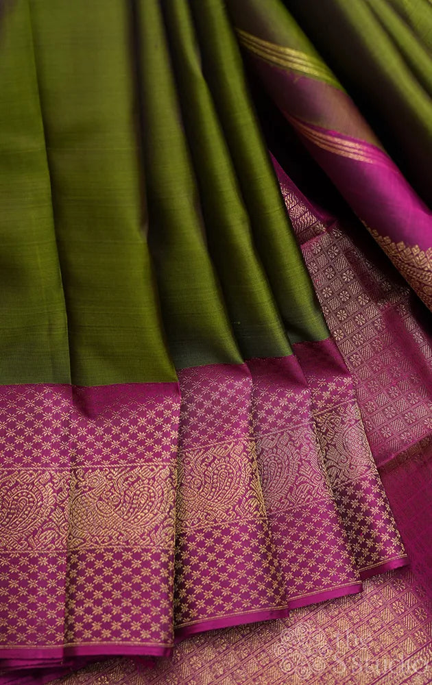 Moss green kanchi pattu saree with purple border