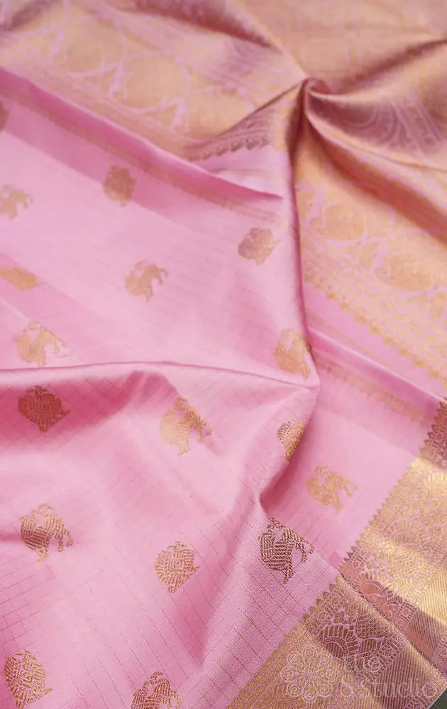 Light pink zari checked kanchipuram silk saree with yaazhi motifs