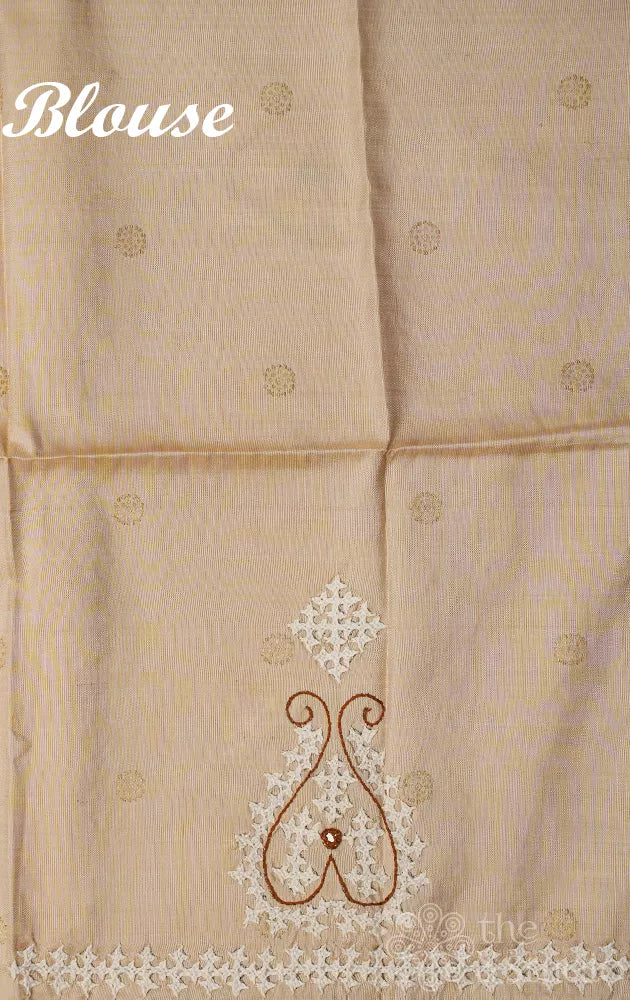 Off white and golden tissue kanchipuram silk saree with kutch embroidery