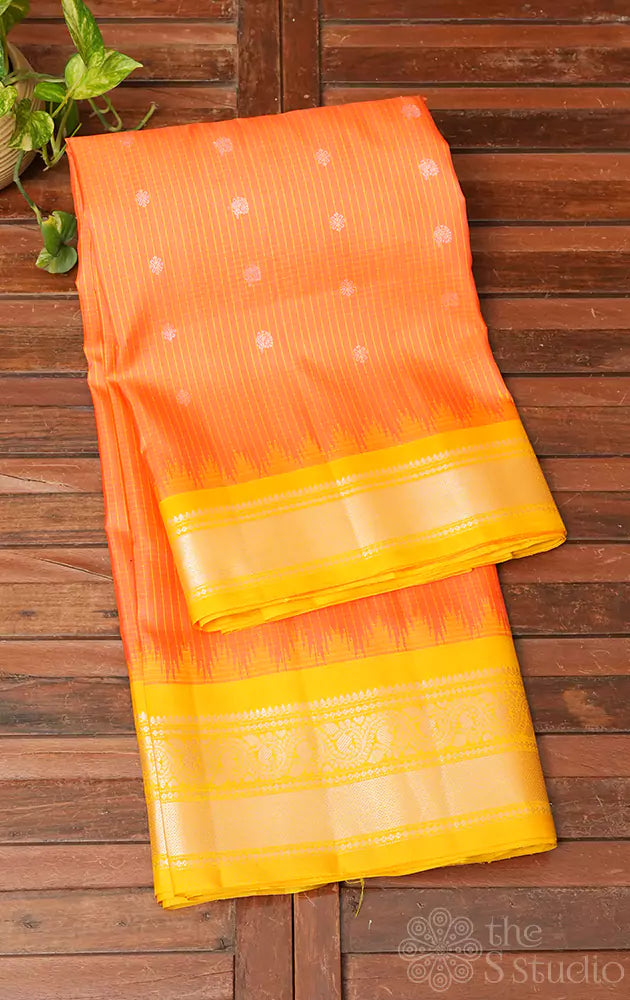 Peachish orange Gadwal silk saree with yellow zari border