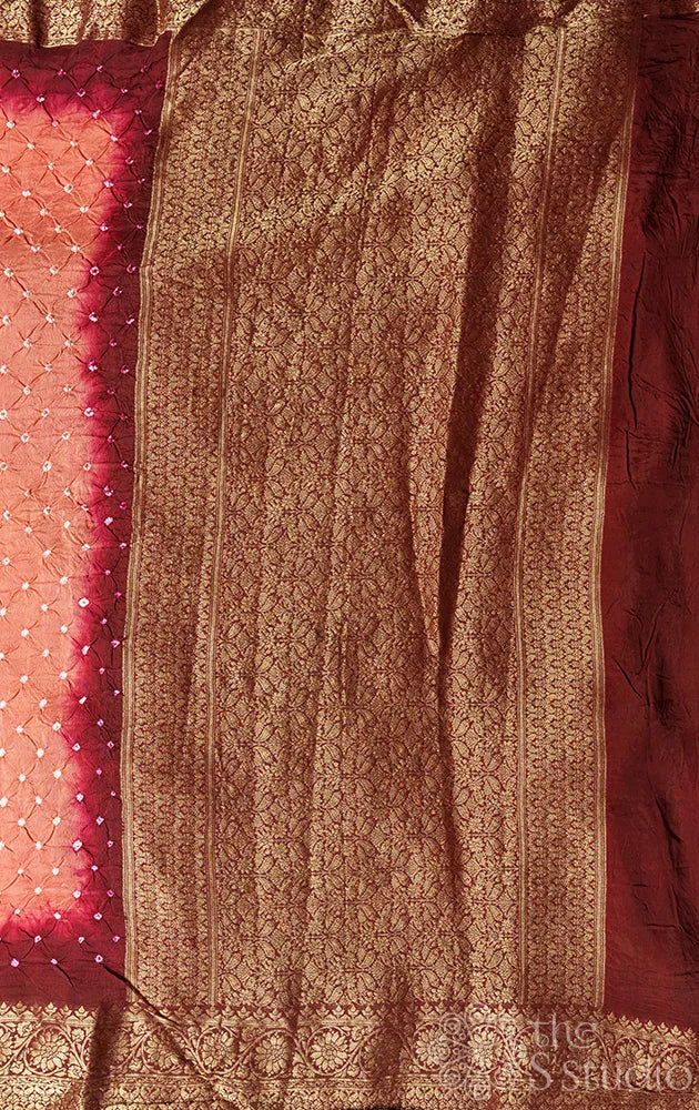 Orange bandhani silk saree with maroon banarasi pallu