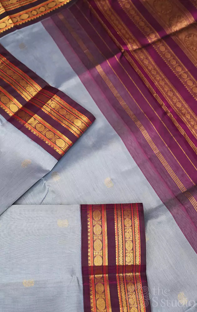 Grey silk cotton saree with purple korvai border