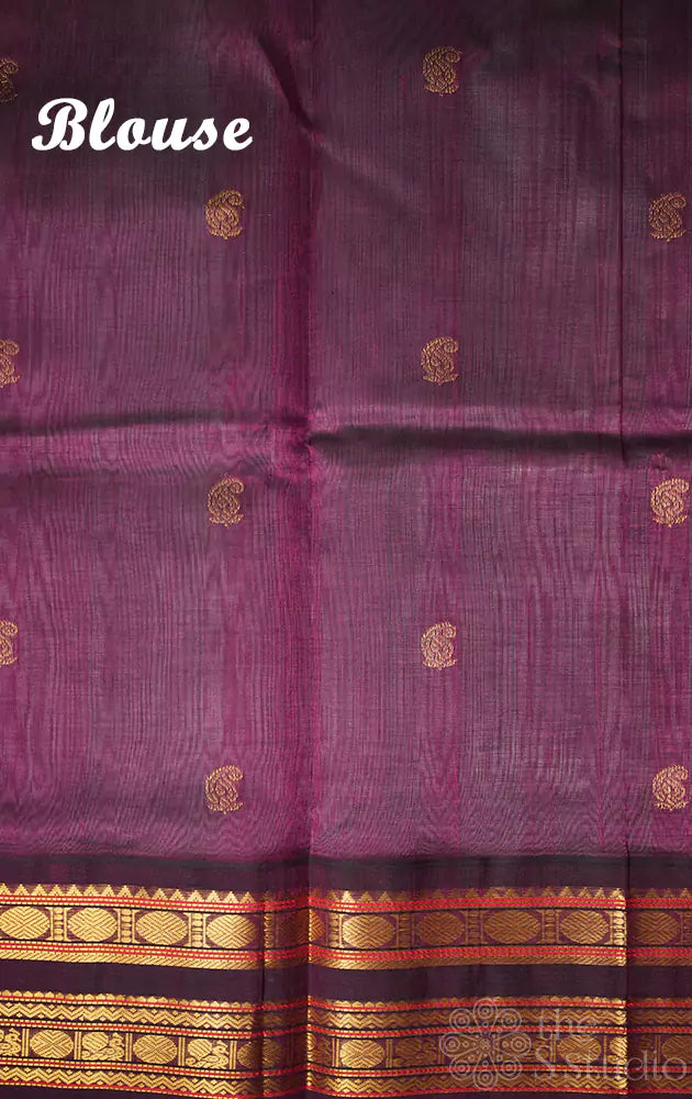 Grey silk cotton saree with purple korvai border