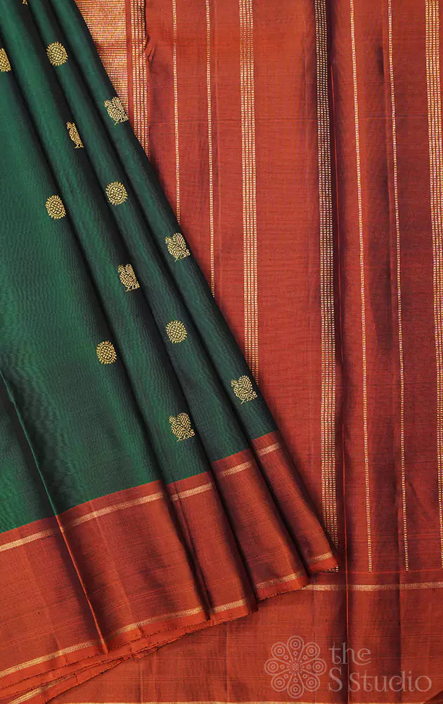 Green kanjivaram silk saree with rust border