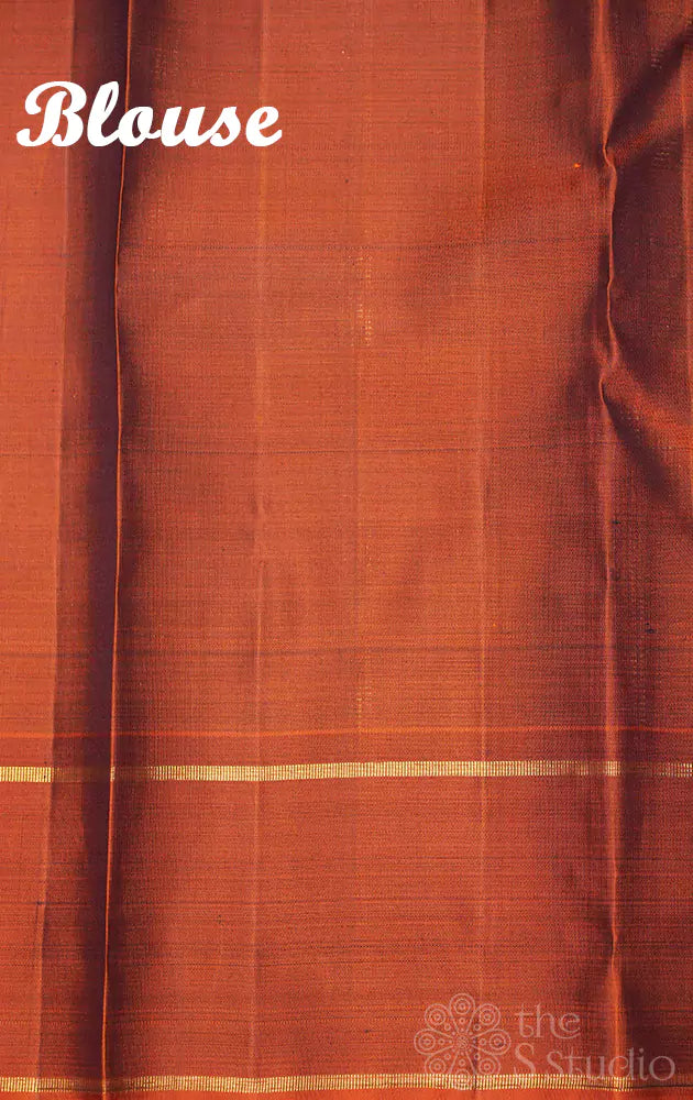 Green kanjivaram silk saree with rust border