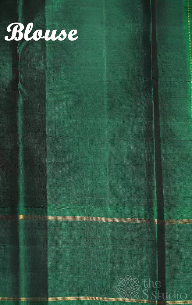 Purple kanjivaram silk saree with green border