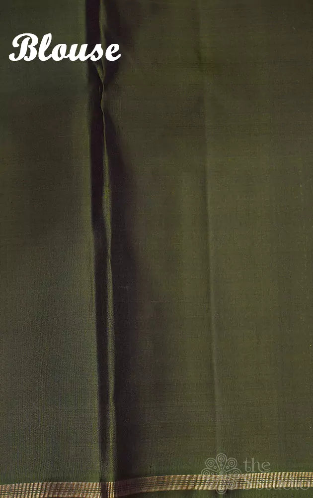 Light pink borderless kanchipuram silk saree with green pallu