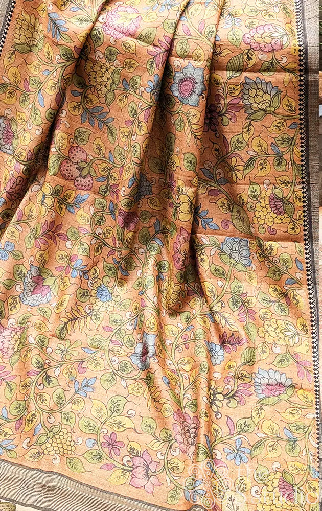 Light orange hand painted kalamkari tussar silk saree with black border