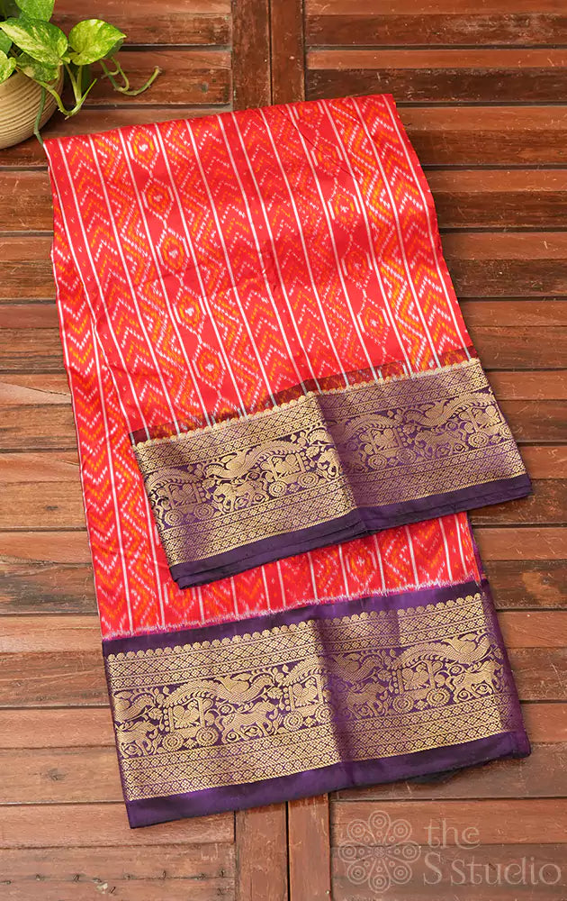 Red ikat silk saree with purple kanchi style zari border
