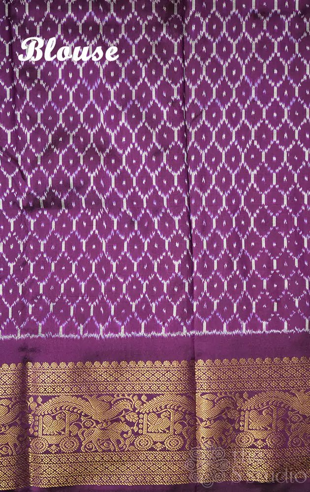 Red ikat silk saree with purple kanchi style zari border