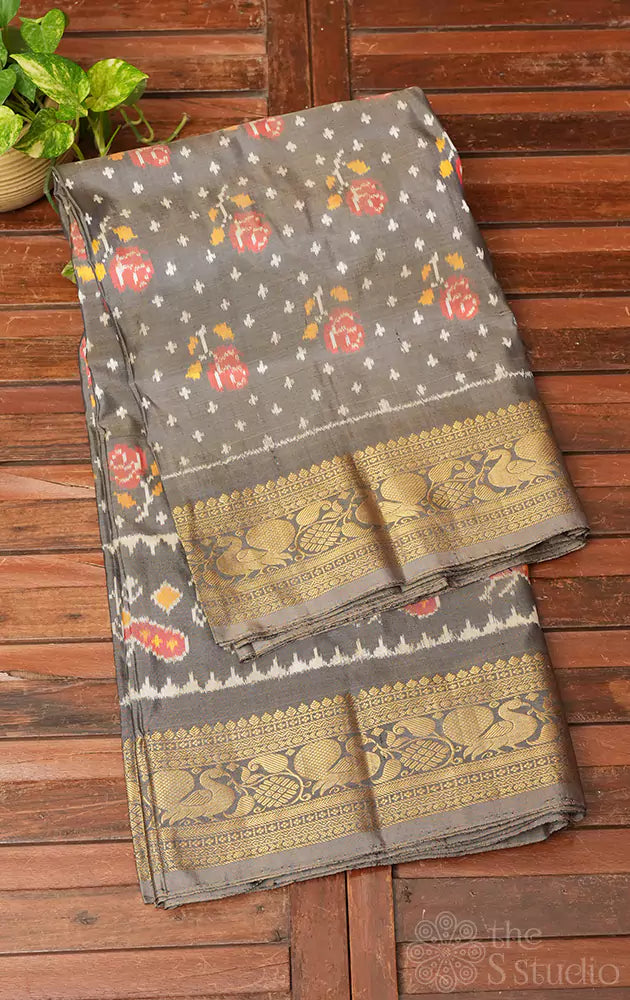 Grey ikkat silk saree with rich zari border