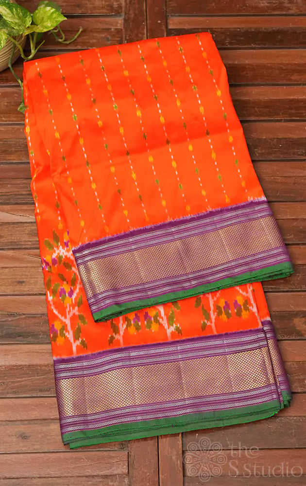 Orange ikkat silk saree with purple border