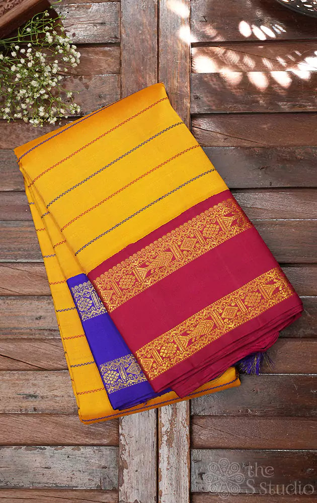 Mango yellow kanchi silk saree with ganga jamuna border