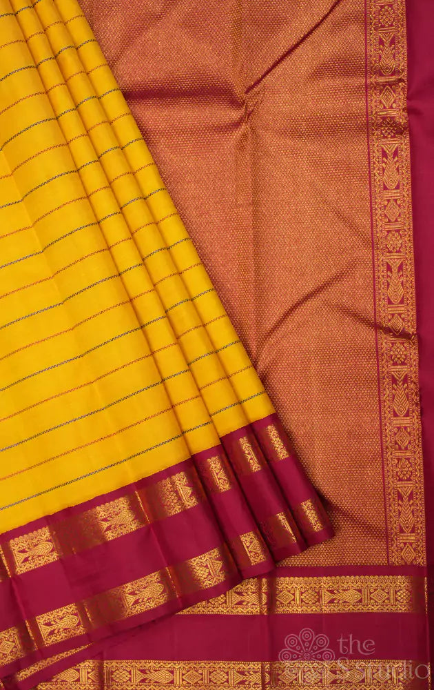 Mango yellow kanchi silk saree with ganga jamuna border