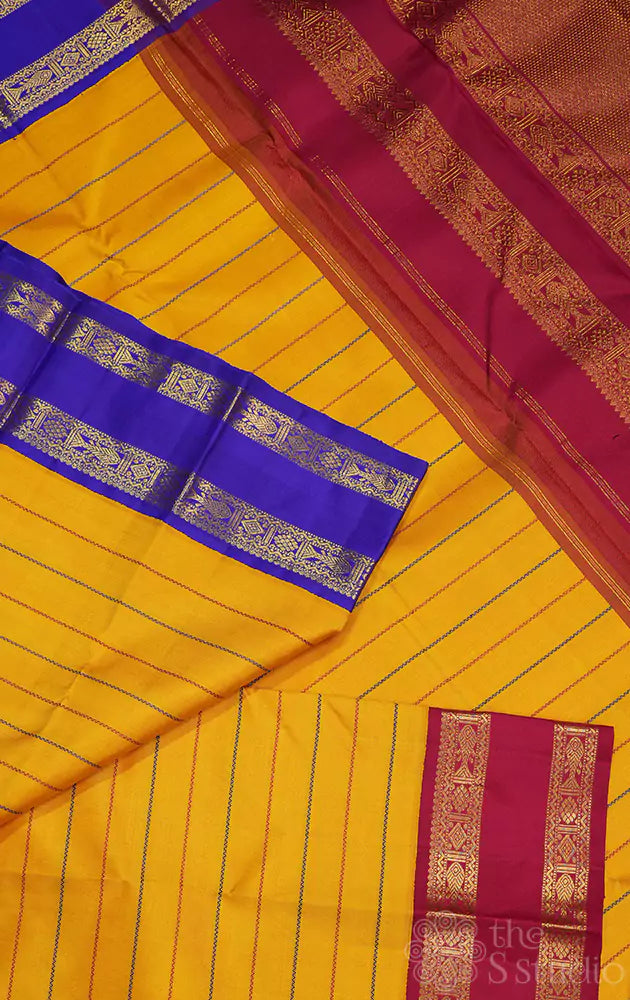 Mango yellow kanchi silk saree with ganga jamuna border