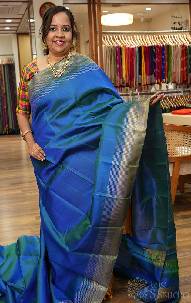 Peacock blue kanchipuram silk saree with seepu reku border