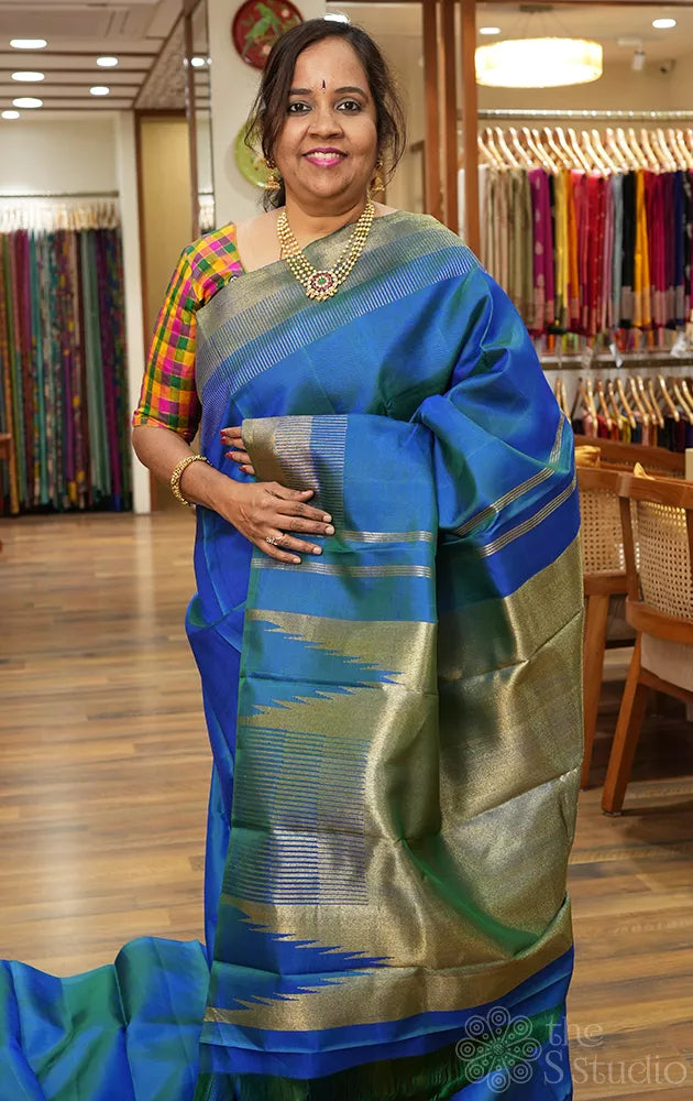 Peacock blue kanchipuram silk saree with seepu reku border