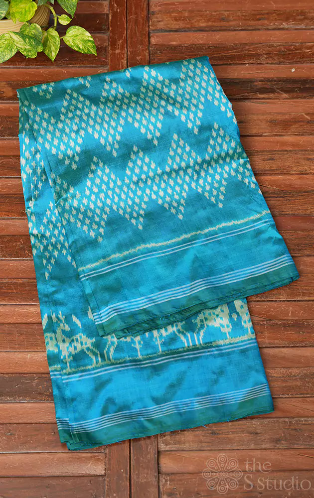 Blue twill ikat silk saree with deer butta