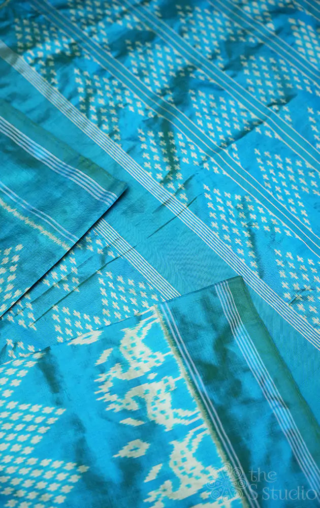 Blue twill ikat silk saree with deer butta