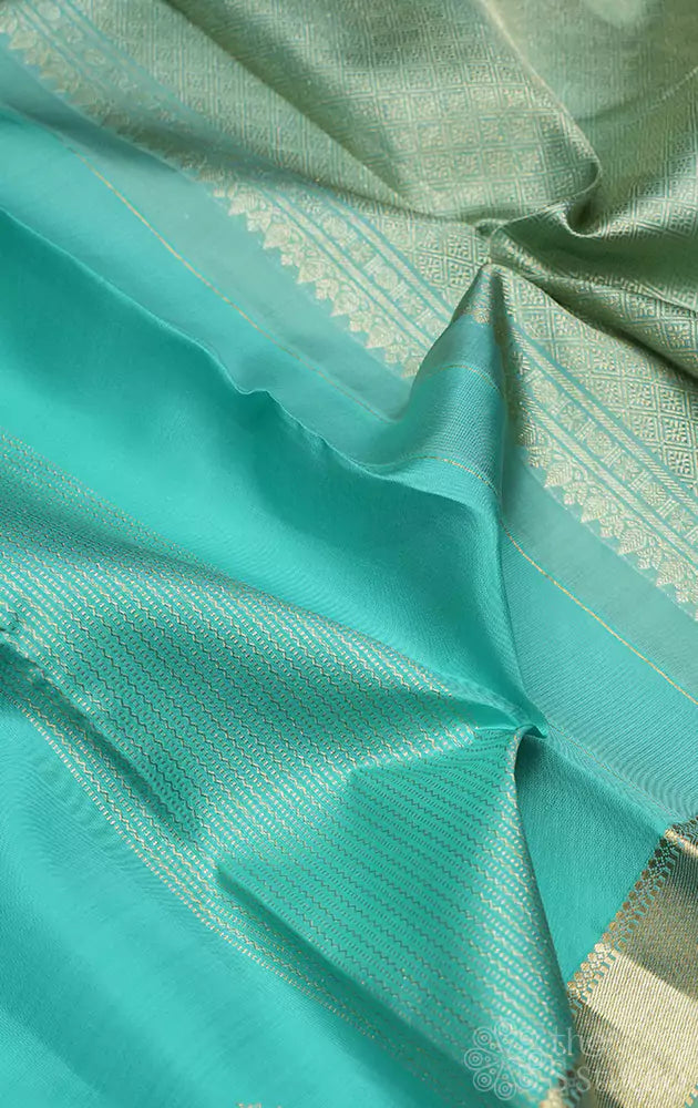 Aqua blue kanjivaram saree with small border