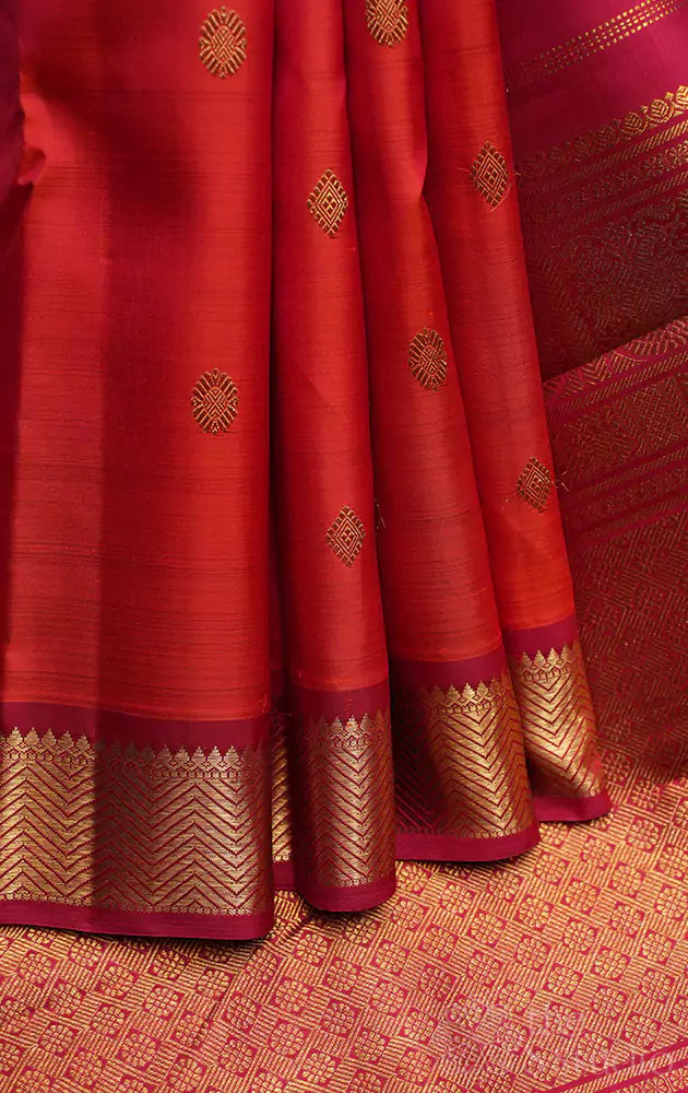 Rust kanchi pattu saree with small maroon border