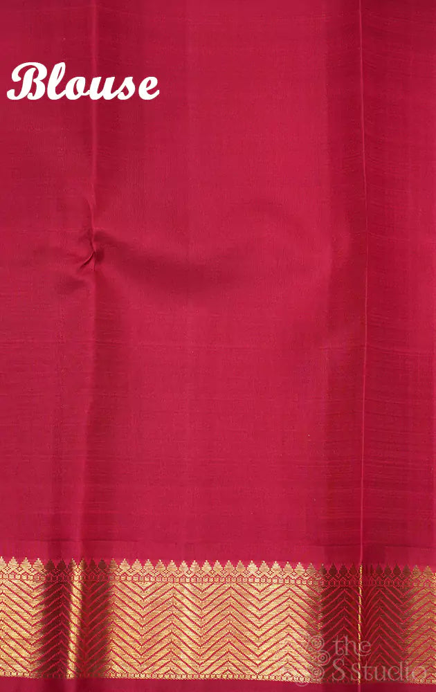 Rust kanchi pattu saree with small maroon border