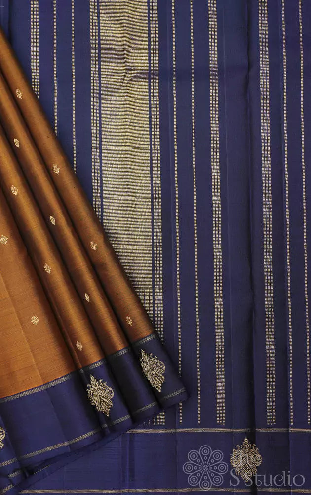 Golden brown kanjivaram silk saree with peacock buttas border