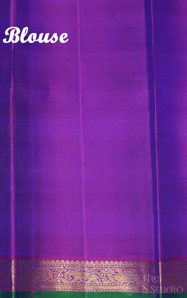 Peacock blue kanchi pattu saree with purple pallu