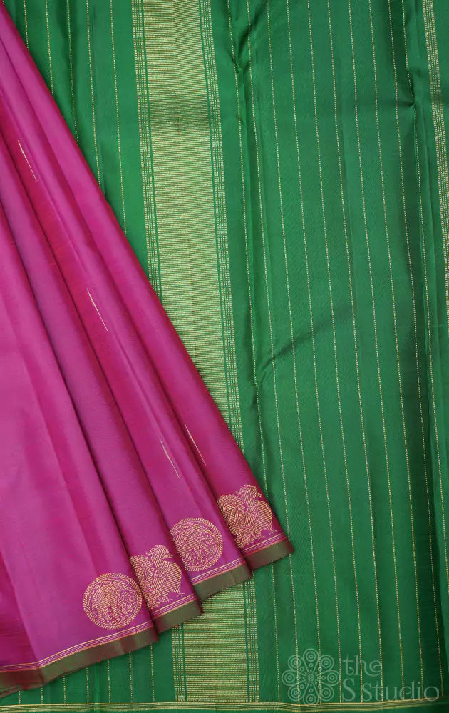 Purple kanchi silk saree with green pallu