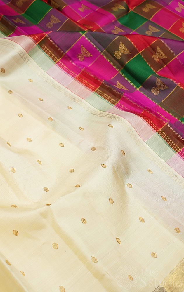 Off white kanchi silk saree with paalum pazhamum checks pallu and blouse
