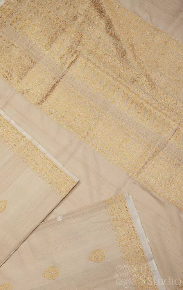 Beige handloom tussar banarasi silk saree with zari weaving