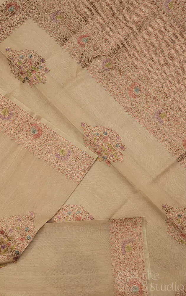 Beige handloom tussar banarasi silk saree with antique zari border