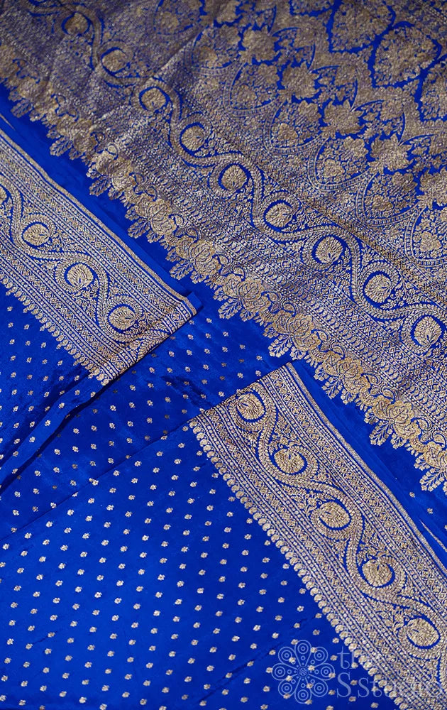 Royal blue crepe banarasi silk saree with antique zari border