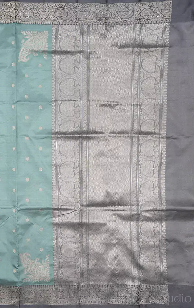 Powder blue handwoven lightweight banarasi katan silk saree with grey contrast border