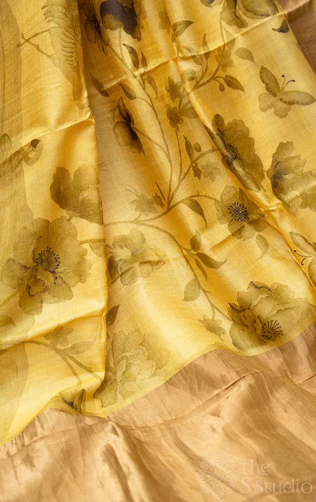 Yellow printed tussar banarasi silk saree with zari border