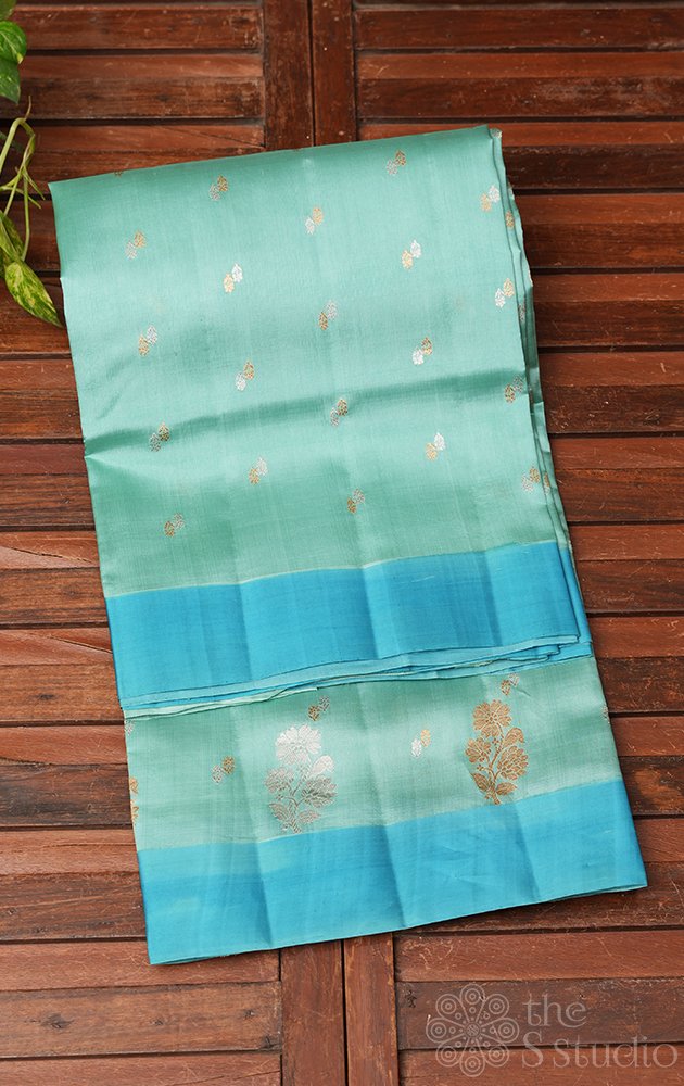 Bluish green soft banarasi handloom katan silk with gold and silver buttas