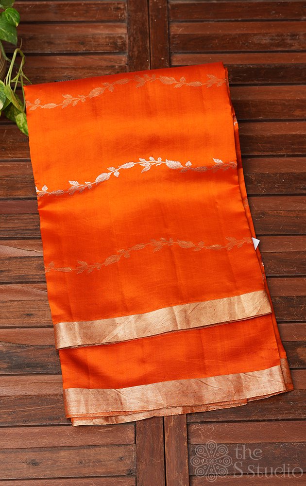 Orange handloom soft katan banarasi silk saree with wavy zari pattern