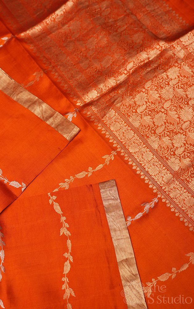 Orange handloom soft katan banarasi silk saree with wavy zari pattern