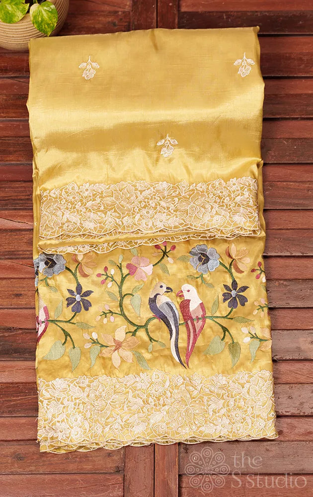 Light yellow semi banarasi silk saree with bird embroidery